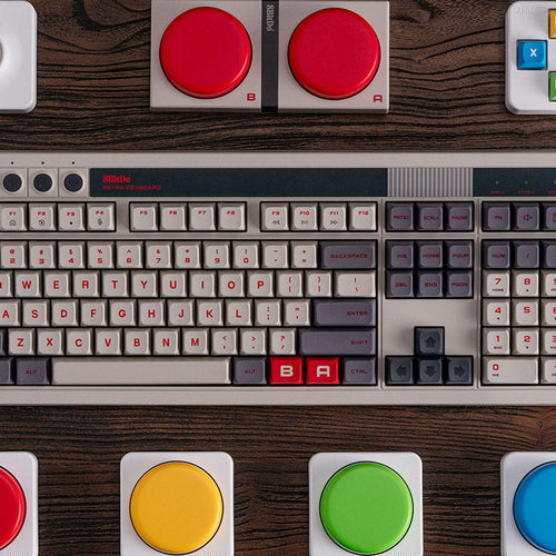 8BitDo Retro 108 Mechanical Keyboard N Edition – Farvevarianter illustreret, kun N Edition medfølger