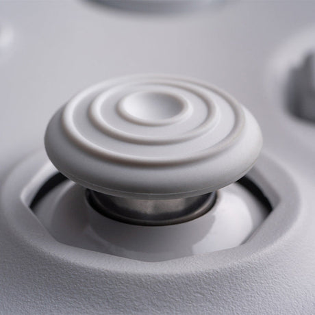 8BitDo 64 Bluetooth – retro-controller, hvid – Thumbstick i nærbillede