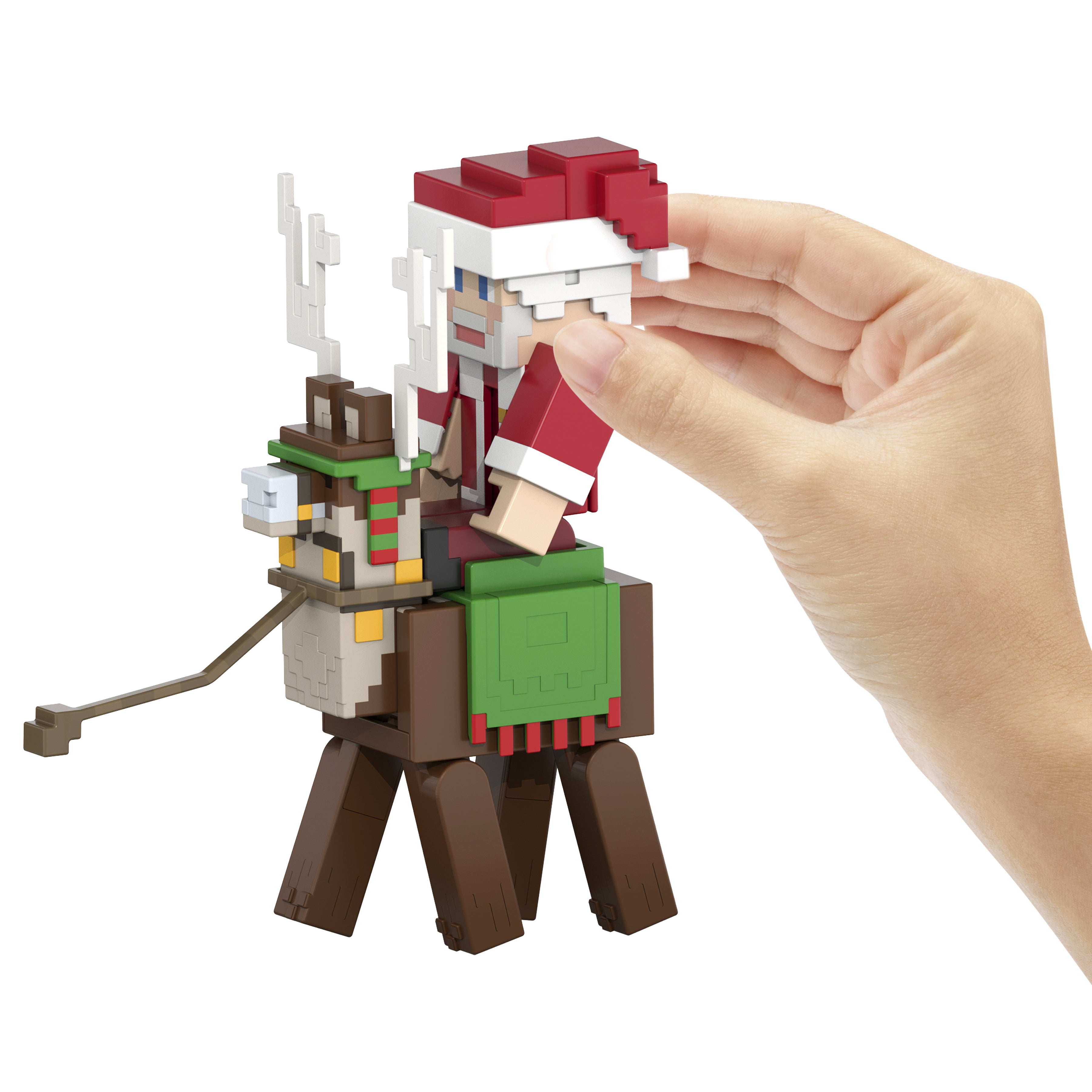 Minecraft-julekalender – en hånd sætter julemanden på rensdyret
